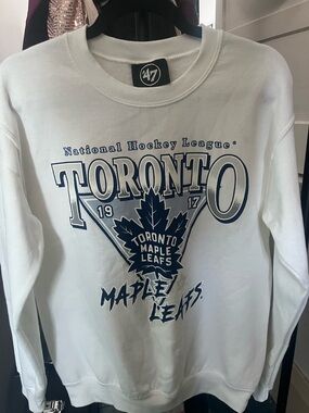 Officially Licensed NHL White Toronto Maple Leafs Crewneck with Navy Crest Print